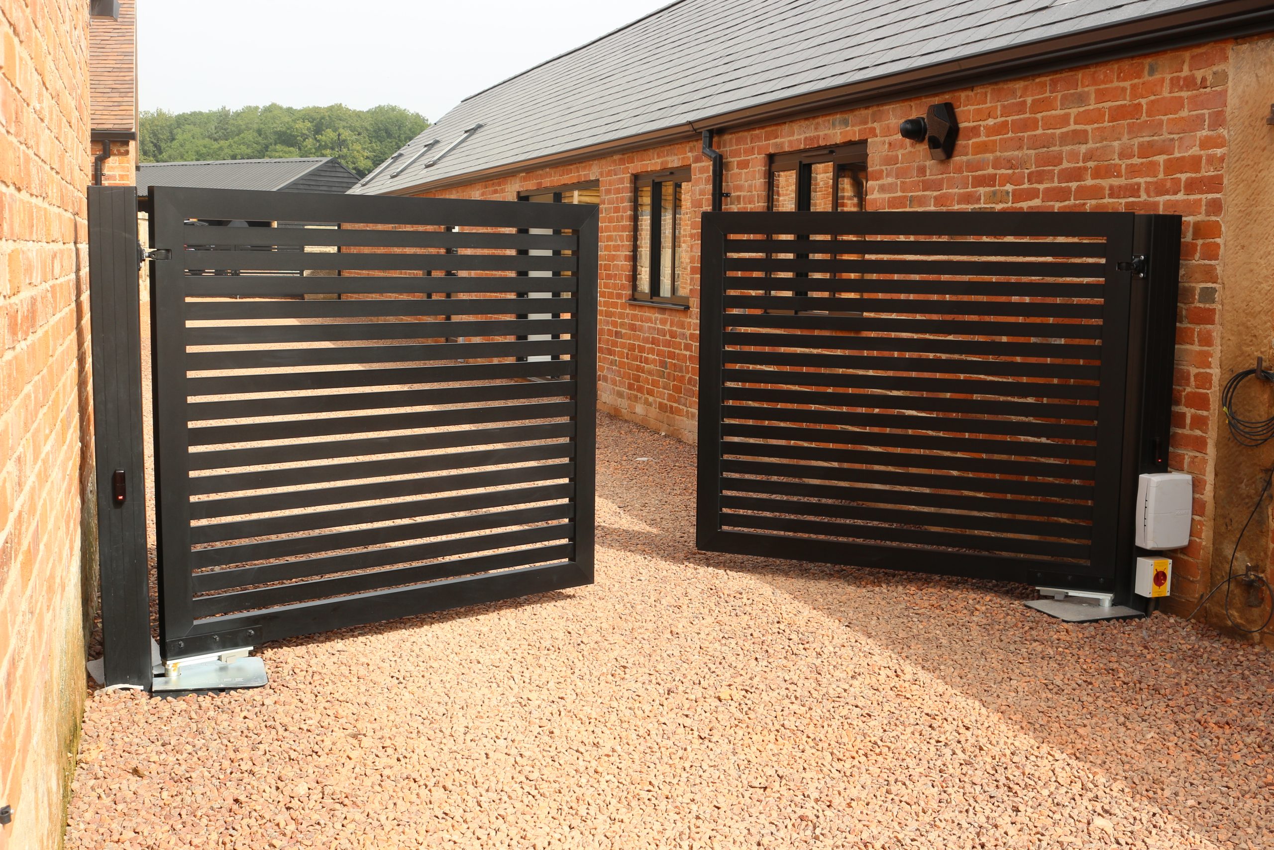 Semi-private Black aluminium gate by TFS Gates