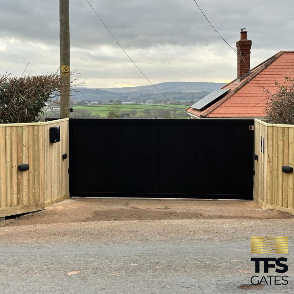 Black Aluminium Gate with Wooden Fence by TFS Gates